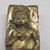  <em>Relief Plaque Depicting a Lion - Headed Deity of Tantric Form</em>, 16th-17th century. Repousse and partially gilded copper mounted on wood, 6 1/2 x 2 1/8 in. (16.5 x 5.4 cm). Brooklyn Museum, Gift of Dr. Bertram H. Schaffner, 73.99.25. Creative Commons-BY (Photo: , CUR.73.99.25_detail01.jpg)