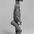 Montol. <em>Standing Male Figure</em>, early 20th century. Wood, 17 1/4 x 6 x 5 in. (43.8 x 15.3 x 12.7 cm). Brooklyn Museum, Gift of Dr. and Mrs. Ernst Anspach, 74.171.1. Creative Commons-BY (Photo: Brooklyn Museum, CUR.74.171.1_print_side_bw.jpg)