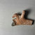 Coptic. <em>Fragment in Shape of a Bird</em>. Clay, pigment, 2 11/16 × 3 1/4 × 1 1/8 in. (6.8 × 8.2 × 2.8 cm). Brooklyn Museum, Anonymous gift, 74.46.1. Creative Commons-BY (Photo: Brooklyn Museum, CUR.74.46.1_front.JPG)