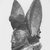 Yorùbá. <em>Helmet mask (ère egúngún)</em>, late 19th or early 20th century. Wood, pigment, ferrous nails, H: 11 1/2 in. (29.2 cm). Brooklyn Museum, Gift of Dr. and Mrs. Abbott A. Lippman, 75.149.1. Creative Commons-BY (Photo: Brooklyn Museum, CUR.75.149.1_print_threequarter_bw.jpg)