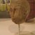 Nubian. <em>Head from a Ba-Bird Statue</em>, 1st century B.C.E.-2nd century C.E. Sandstone, 6 3/4 x 5 x 6 in. (17.1 x 12.7 x 15.2 cm). Brooklyn Museum, Charles Edwin Wilbour Fund, 75.26. Creative Commons-BY (Photo: Brooklyn Museum, CUR.75.26_afrinnov.jpg)