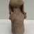 Jama-Coaque. <em>Seated Male Figure</em>, 500 B.C.E.–500 C.E. Ceramic, pigment, 8 × 4 3/4 × 4 in. (20.3 × 12.1 × 10.2 cm). Brooklyn Museum, Gift of Egizia Modiano, 76.166.28. Creative Commons-BY (Photo: Brooklyn Museum photgoraph, CUR.76.166.28_back.jpg)