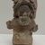 Jama-Coaque. <em>Seated Male Figure</em>, 500 B.C.E.–500 C.E. Ceramic, pigment, 8 × 4 3/4 × 4 in. (20.3 × 12.1 × 10.2 cm). Brooklyn Museum, Gift of Egizia Modiano, 76.166.28. Creative Commons-BY (Photo: Brooklyn Museum photgoraph, CUR.76.166.28_front.jpg)