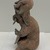 Jama-Coaque. <em>Seated Male Figure</em>, 500 B.C.E.–500 C.E. Ceramic, pigment, 8 × 4 3/4 × 4 in. (20.3 × 12.1 × 10.2 cm). Brooklyn Museum, Gift of Egizia Modiano, 76.166.28. Creative Commons-BY (Photo: Brooklyn Museum photgoraph, CUR.76.166.28_left.jpg)