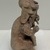 Jama-Coaque. <em>Seated Male Figure</em>, 500 B.C.E.–500 C.E. Ceramic, pigment, 8 × 4 3/4 × 4 in. (20.3 × 12.1 × 10.2 cm). Brooklyn Museum, Gift of Egizia Modiano, 76.166.28. Creative Commons-BY (Photo: Brooklyn Museum photgoraph, CUR.76.166.28_right.jpg)