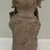 Jama-Coaque. <em>Seated Figure</em>, 500 B.C.E.–C.E.500. Ceramic, pigment?, 9 × 5 × 4 3/4 in. (22.9 × 12.7 × 12.1 cm). Brooklyn Museum, Gift of Egizia Modiano, 76.166.3. Creative Commons-BY (Photo: Brooklyn Museum photgoraph, CUR.76.166.3_back.jpg)