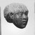  <em>One Head from a Statue of a Prisoner</em>, 750-342 B.C.E. Limestone, 2 5/8 x 2 3/8 x 2 1/2 in. (6.7 x 6.1 x 6.3 cm). Brooklyn Museum, Gift of Miltiades Kyrtsis, 78.190. Creative Commons-BY (Photo: Brooklyn Museum, CUR.78.190_NegB_print_bw.jpg)