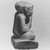  <em>Figurine of an Ithyphallic Male Wearing a Rosette Crown</em>, 664–332 B.C.E. Faience, 1 7/16 × 1 × 3/4 in. (3.6 × 2.6 × 1.9 cm). Brooklyn Museum, Gift of Lucien Viola, 79.175. Creative Commons-BY (Photo: Brooklyn Museum, CUR.79.175_NegL885_10_print_bw.jpg)