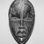 Dan. <em>Dean Gle Mask</em>, late 19th-early 20th century. Wood, pigment, 9 3/4 x 6 x 3 in. (24.8 x 15.2 x 7.6 cm). Brooklyn Museum, Gift of Evelyn K. Kossak, 80.244. Creative Commons-BY (Photo: Brooklyn Museum, CUR.80.244_print_front_bw.jpg)