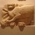  <em>The Goddess Mafdet (?)</em>, 3rd century B.C.E. Limestone, 11 x 16 1/8 x 3 3/4 in. (28 x 41 x 9.5 cm). Brooklyn Museum, Gift of the Egyptian Antiquities Organization, 80.7.7. Creative Commons-BY (Photo: Brooklyn Museum, CUR.80.7.7_wwg8.jpg)