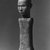 Sa'dan Toraja. <em>Male Funerary Figure (Tau-tau, Bombo di Kita)</em>, 20th century. Wood, 57 x 7 1/2 x 7 in. (144.8 x 19.1 x 17.8 cm). Brooklyn Museum, Purchased with funds given by Frieda and Milton F. Rosenthal, 82.11a-b. Creative Commons-BY (Photo: Brooklyn Museum, CUR.82.11a-b_top_print_bw.jpg)