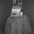 Suku. <em>Hemba Mask</em>, 20th century. Wood, raffia, pigment, 26 x 21 in. (66.0 x 53.3 cm). Brooklyn Museum, Gift of Dr. and Mrs. Abbott A. Lippman, 85.143. Creative Commons-BY (Photo: Brooklyn Museum, CUR.85.143_print_threequarter_bw.jpg)