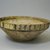  <em>Bowl</em>, 10th-12th century. Ceramic, white engobe, brown, yellow, and green slip, transparent colorless glaze, 4 1/8 x 10 1/2 in. (10.5 x 26.7 cm). Brooklyn Museum, Gift of the Ernest Erickson Foundation, Inc., 86.227.13. Creative Commons-BY (Photo: Brooklyn Museum, CUR.86.227.13_exterior.jpg)