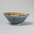  <em>Bowl</em>, late 12th-early 13th century. Ceramic, lusterware, transparent blue glaze on exterior, 2 1/4 x 5 11/16 in. (5.7 x 14.4 cm). Brooklyn Museum, Gift of the Ernest Erickson Foundation, Inc., 86.227.64. Creative Commons-BY (Photo: Brooklyn Museum, CUR.86.227.64_exterior.jpg)