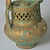  <em>Vase in the Shape of a Pitcher, Lajevardina ware</em>, mid-13th century. Ceramic; fritware, reticulated, molded, and painted in turquoise, red, white with gold-leaf overglaze over an opaque transparent glaze, 7 9/16 x 5 11/16 in. (19.2 x 14.5 cm). Brooklyn Museum, Gift of the Ernest Erickson Foundation, Inc., 86.227.67. Creative Commons-BY (Photo: Brooklyn Museum, CUR.86.227.67_detail.jpg)