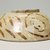  <em>Fragment of a Bowl</em>, 11th century. Ceramic, monochrome lusterware, pink earthenware body, 3 3/8 x 5 1/8 x 9 7/16 in. (8.6 x 13 x 24 cm). Brooklyn Museum, Gift of the Ernest Erickson Foundation, Inc., 86.227.81. Creative Commons-BY (Photo: Brooklyn Museum, CUR.86.227.81_fragment_view1.jpg)