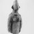  <em>Female Figure</em>, ca. 14th-16th century. Terra cotta, 13 5/8 x 5 1/2 x 4 in. (34.6 x 14 x 10.2 cm). Brooklyn Museum, Gift of Dr. and Mrs. Eugene Becker, 87.214. Creative Commons-BY (Photo: Brooklyn Museum, CUR.87.214_print_threequarter_bw.jpg)