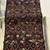 Possibly Ait Mgild. <em>Cushion Cover</em>. Wool, cotton brocade, sequins, 52 x 20 x 3/16 in. (132.1 x 50.8 x 0.5cm). Brooklyn Museum, Gift of Dr. Virgil H. Bird, 87.227.1. Creative Commons-BY (Photo: Brooklyn Museum, CUR.87.227.1_front.jpg)