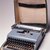 Marcello Nizzoli. <em>Portable Typewriter with Cover and Carrying Case</em>, 1950 (design); later manufacture. Painted metal, plastic, rubber, leatherette, 3 x 10 9/16 x 12 3/4 in. (7.6 x 26.8 x 32.4 cm). Brooklyn Museum, Anonymous gift, 88.106a-c. Creative Commons-BY (Photo: Brooklyn Museum, CUR.88.106a-c.jpg)
