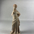 Greek. <em>Standing Figure of Woman, Tanagra Style</em>. Terracotta, pigment, 6 1/2 in.  (16.5 cm). Brooklyn Museum, Brooklyn Museum Collection, X249.74. Creative Commons-BY (Photo: Brooklyn Museum, CUR.X249.74_view01.jpeg)