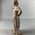 Greek. <em>Standing Figure of Woman, Tanagra Style</em>. Terracotta, pigment, 6 1/2 in.  (16.5 cm). Brooklyn Museum, Brooklyn Museum Collection, X249.74. Creative Commons-BY (Photo: Brooklyn Museum, CUR.X249.74_view02.jpeg)