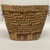 Tsilhqot'in. <em>Coiled Burden Basket</em>, 1901-1933. Plant fiber, wood, 10 × 14 1/8 × 10 3/4 in. (25.4 × 35.9 × 27.3 cm). Brooklyn Museum, Brooklyn Museum Collection, X854.9. Creative Commons-BY (Photo: Brooklyn Museum, CUR.X854.9_overall01.JPG)