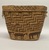Tsilhqot'in. <em>Coiled Burden Basket</em>, 1901-1933. Plant fiber, wood, 10 × 14 1/8 × 10 3/4 in. (25.4 × 35.9 × 27.3 cm). Brooklyn Museum, Brooklyn Museum Collection, X854.9. Creative Commons-BY (Photo: Brooklyn Museum, CUR.X854.9_overall02.JPG)