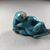  <em>One Erotic Figure of a Male</em>, 305-30 B.C.E. Faience, 1 7/16 x 2 1/8 x 3/4 in. (3.7 x 5.4 x 1.9 cm). Brooklyn Museum, Brooklyn Museum Collection, X865.4. Creative Commons-BY (Photo: , CUR.X865.4_view04.jpg)