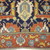  <em>Shield-Varient Carpet</em>, mid 18th–early 19th century. Wool and silk, Ghiordes knot: field, white, light blue, yellow on dark blue ground; border, yellow and green on red ground, 129 x 73 in.  (327.7 x 185.4 cm). Brooklyn Museum, Gift of the Ernest Erickson Foundation, Inc., 86.227.116. Creative Commons-BY (Photo: Brooklyn Museum, CUR_86.227.116_detail003.JPG)