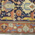  <em>Shield-Varient Carpet</em>, mid 18th–early 19th century. Wool and silk, Ghiordes knot: field, white, light blue, yellow on dark blue ground; border, yellow and green on red ground, 129 x 73 in.  (327.7 x 185.4 cm). Brooklyn Museum, Gift of the Ernest Erickson Foundation, Inc., 86.227.116. Creative Commons-BY (Photo: Brooklyn Museum, CUR_86.227.116_detail054.JPG)