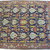  <em>Shield-Varient Carpet</em>, mid 18th–early 19th century. Wool and silk, Ghiordes knot: field, white, light blue, yellow on dark blue ground; border, yellow and green on red ground, 129 x 73 in.  (327.7 x 185.4 cm). Brooklyn Museum, Gift of the Ernest Erickson Foundation, Inc., 86.227.116. Creative Commons-BY (Photo: Brooklyn Museum, CUR_86.227.116_detail057.JPG)