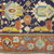  <em>Shield-Varient Carpet</em>, mid 18th–early 19th century. Wool and silk, Ghiordes knot: field, white, light blue, yellow on dark blue ground; border, yellow and green on red ground, 129 x 73 in.  (327.7 x 185.4 cm). Brooklyn Museum, Gift of the Ernest Erickson Foundation, Inc., 86.227.116. Creative Commons-BY (Photo: Brooklyn Museum, CUR_86.227.116_detail058.JPG)