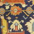  <em>Shield-Varient Carpet</em>, mid 18th–early 19th century. Wool and silk, Ghiordes knot: field, white, light blue, yellow on dark blue ground; border, yellow and green on red ground, 129 x 73 in.  (327.7 x 185.4 cm). Brooklyn Museum, Gift of the Ernest Erickson Foundation, Inc., 86.227.116. Creative Commons-BY (Photo: Brooklyn Museum, CUR_86.227.116_detail072.JPG)