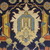  <em>Shield-Varient Carpet</em>, mid 18th–early 19th century. Wool and silk, Ghiordes knot: field, white, light blue, yellow on dark blue ground; border, yellow and green on red ground, 129 x 73 in.  (327.7 x 185.4 cm). Brooklyn Museum, Gift of the Ernest Erickson Foundation, Inc., 86.227.116. Creative Commons-BY (Photo: Brooklyn Museum, CUR_86.227.116_detail077.JPG)