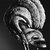  <em>Mask (Tatanua)</em>, 19th century. Wood, rattan, bark cloth, fiber, sea sponge, tapestry turban snail (Turbo petholatus) opercula, pigment, 17 × 12 × 13 in. (43.2 × 30.5 × 33 cm). Brooklyn Museum, Brooklyn Museum Collection, X1033. Creative Commons-BY (Photo: Brooklyn Museum, X1033_view2_acetate_bw.jpg)