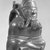 Chimú Inca. <em>Stirrup Spout Bottle depicting a Man Playing a Panpipe</em>, 1470-1532. Ceramic, 7 x 4 1/4 x 6 in. (17.8 x 10.8 x 15.2 cm). Brooklyn Museum, Brooklyn Museum Collection, X487. Creative Commons-BY (Photo: Brooklyn Museum, X487_view2_acetate_bw.jpg)