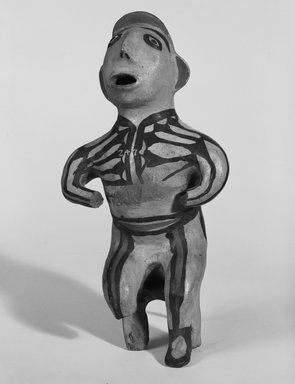 Ko-Tyit (Cochiti Pueblo). <em>Seated Image</em>. Ceramic, pigment, 10 1/2 in.  (26.7 cm). Brooklyn Museum, Riggs Pueblo Pottery Fund, 02.257.2470. Creative Commons-BY (Photo: Brooklyn Museum, 02.257.2470_front_bw_SL5.jpg)