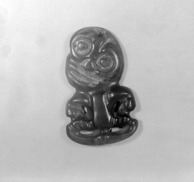 Maori. <em>Pendant (Hei-tiki)</em>, 18th century (possibly). Nephrite, sealing wax, 2 3/4 x 1 11/16 x 1 3/16 in.  (7 x 4.3 x 3 cm). Brooklyn Museum, Brooklyn Museum Collection, 03.212. Creative Commons-BY (Photo: Brooklyn Museum, 03.212_acetate_bw.jpg)