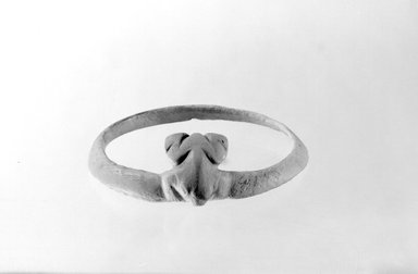 Hohokam. <em>Carved Frog-shaped Bracelet</em>, 1100–1300. Clam Shell, 5/16 x 3 1/4 in. (0.8 x 8.3 cm). Brooklyn Museum, Museum Expedition 1903, Museum Collection Fund, 03.325.4155. Creative Commons-BY (Photo: Brooklyn Museum, 03.325.4155_acetate_bw.jpg)