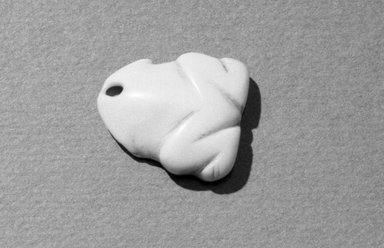 Southwest (unidentified). <em>Frog-shaped Pendant</em>, 600–1300. Shell, 1 x 13/16 x 3/16 in. (2.5 x 2 x 0.5 cm). Brooklyn Museum, Museum Expedition 1903, Museum Collection Fund, 03.325.4492. Creative Commons-BY (Photo: Brooklyn Museum, 03.325.4492_acetate_bw.jpg)