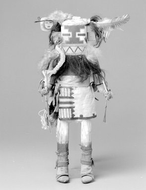 A:shiwi (Zuni Pueblo). <em>Kachina Doll (Awethlu-ye-ya)</em>, late 19th century. Wood, hide, feather, fur, string, cloth, plant stems, 16 3/4 x 6 1/4 x 5 1/4 in. (42.5 x 15.9 x 13.3 cm). Brooklyn Museum, Museum Expedition 1903, Museum Collection Fund, 03.325.4610. Creative Commons-BY (Photo: Brooklyn Museum, 03.325.4610_bw.jpg)