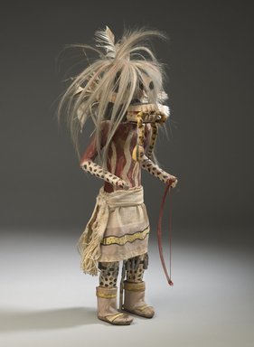 A:shiwi (Zuni Pueblo). <em>Kachina Doll (Hilili Kohanna)</em>, late 19th century. Wood, pigment, horse hair, hide, cotton, feathers, tin, 20 x 6 1/2 x 5 1/2 in. (50.8 x 16.5 x 14 cm). Brooklyn Museum, Museum Expedition 1903, Museum Collection Fund, 03.325.4648. Creative Commons-BY (Photo: Brooklyn Museum, 03.325.4648_threequarter_PS6.jpg)