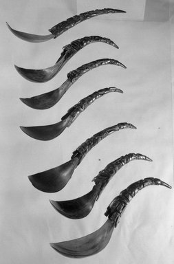 Haida. <em>Spoon (Slagwul) with Depiction of Killer Whale, Shaman and Land Otter</em>, 19th century. Horn, 10 5/8 x 1 11/16 x 1 in.  (27 x 4.3 x 2.5 cm). Brooklyn Museum, Museum Expedition 1905, Museum Collection Fund, 05.588.7422. Creative Commons-BY (Photo: , 05.252_05.304_05.588.7422_acetate_bw.jpg)