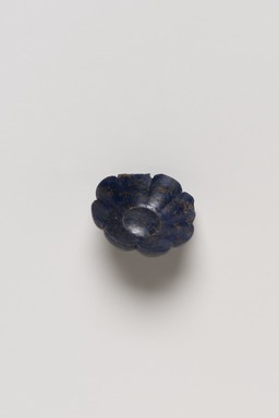  <em>Flower</em>, ca. 1539-1292 B.C.E. Lapis lazuli, 3/4 x greatest diam. 1 1/4 in. (1.9 x 3.1 cm). Brooklyn Museum, Charles Edwin Wilbour Fund, 05.326. Creative Commons-BY (Photo: Brooklyn Museum, 05.326_PS20.jpg)