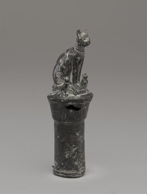  <em>Goddess Bastet as a Cat on a Lotus Column</em>, 664–30 B.C.E. Bronze, 7 11/16 x 1 15/16 x 4 1/8 in. (19.5 x 5 x 10.4 cm). Brooklyn Museum, Charles Edwin Wilbour Fund, 05.339. Creative Commons-BY (Photo: Brooklyn Museum, 05.339_view1_PS9.jpg)