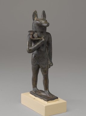  <em>The God Anubis</em>, 332 B.C.E.-200 C.E. Bronze, 7 15/16 x 2 9/16 x 3 1/16 in. (20.2 x 6.5 x 7.7 cm). Brooklyn Museum, Museum Collection Fund, 05.398. Creative Commons-BY (Photo: Brooklyn Museum, 05.398_threequarter_PS9.jpg)
