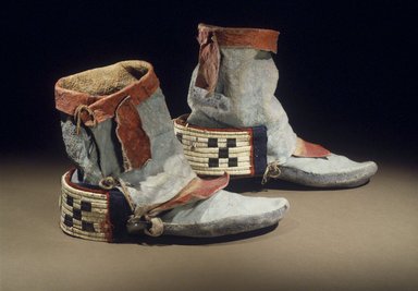 Hopi Pueblo. <em>Dancing Shoes</em>, late 19th century. Deer hide, pigments, sinew, porcupine quill, horse hair, wool, 10 3/16 x 4 5/16 x 7 5/16 in. (25.9 x 11 x 18.6 cm). Brooklyn Museum, Museum Expedition 1905, Museum Collection Fund, 05.588.7175a-b. Creative Commons-BY (Photo: Brooklyn Museum, 05.588.7175a-b.jpg)