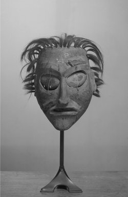 Nuu-chah-nulth (Nootka). <em>Mask</em>, 1868-1900. Wood, pigment, cloth, metal nails, 9 x 6 7/8 in.  (22.9 x 17.5 cm). Brooklyn Museum, By exchange, 05.589.7801. Creative Commons-BY (Photo: Brooklyn Museum, 05.589.7801_acetate_bw.jpg)