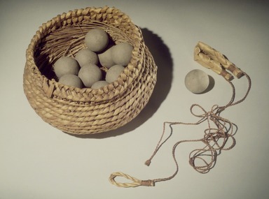 Pen Graves (Pomo). <em>Sling for Killing Marsh Hens or Ducks</em>, ca. 1906. Tule, Indian hemp, 3 3/4 x 1 1/4 x 1 1/4 in. (9.5 x 3.2 x 3.2 cm). Brooklyn Museum, Museum Expedition 1906, Museum Collection Fund, 06.331.8213. Creative Commons-BY (Photo: , 06.331.8213_08.491.8612_08.491.8581.jpg)