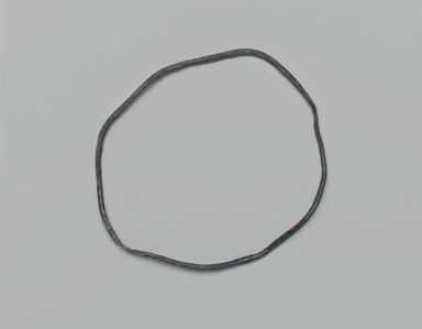  <em>Wire Bracelet</em>, ca. 3800-3400 B.C.E. Copper, 2 3/16 x 1/16 x 2 9/16 in. (5.6 x 0.2 x 6.5 cm). Brooklyn Museum, Charles Edwin Wilbour Fund, 07.447.762. Creative Commons-BY (Photo: Brooklyn Museum, 07.447.762_side1_PS2.jpg)